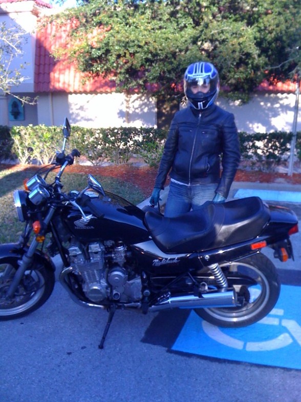 Carey Sparks and our newly-repaired motorcycle!