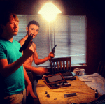 My oldest son and friend cleaning my handguns